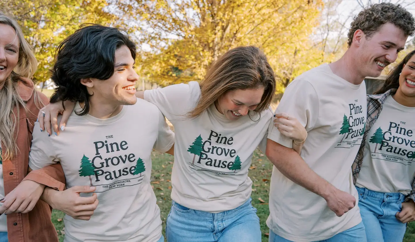 Group shot depicitng serval people wearing custom apparel