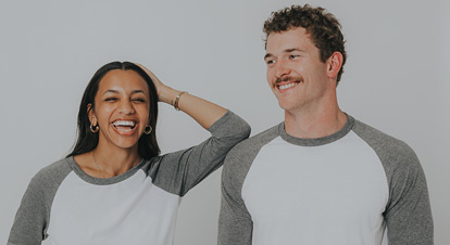 Group shot depicitng serval people wearing custom apparel